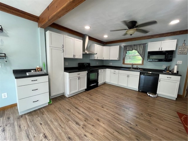 kitchen with dark countertops, ornamental molding, black appliances, and wood finished floors