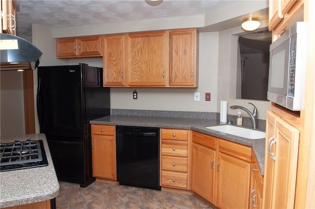 kitchen with a sink and black appliances