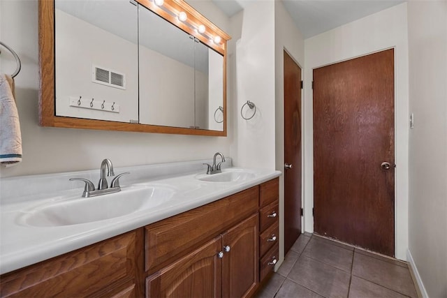 110 Thorncrest Dr, Penn Twp But, PA 16002 - bathroom with tile patterned flooring, visible vents, a sink, and double vanity