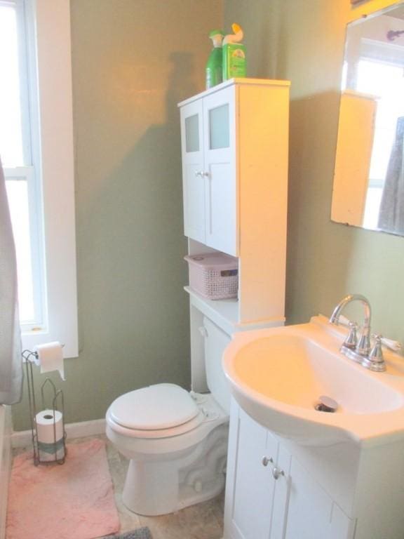 400 12th St, New Brighton, PA 15066 - bathroom featuring toilet and vanity