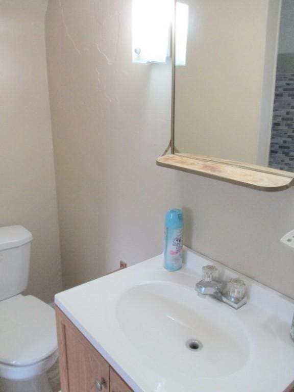 400 12th St, New Brighton, PA 15066 - bathroom featuring vanity and toilet