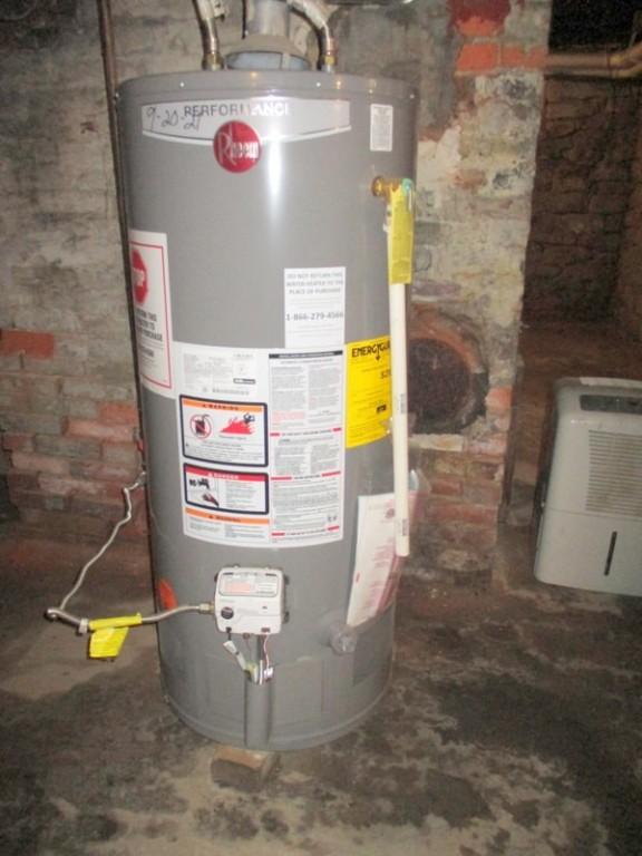 400 12th St, New Brighton, PA 15066 - utility room featuring gas water heater