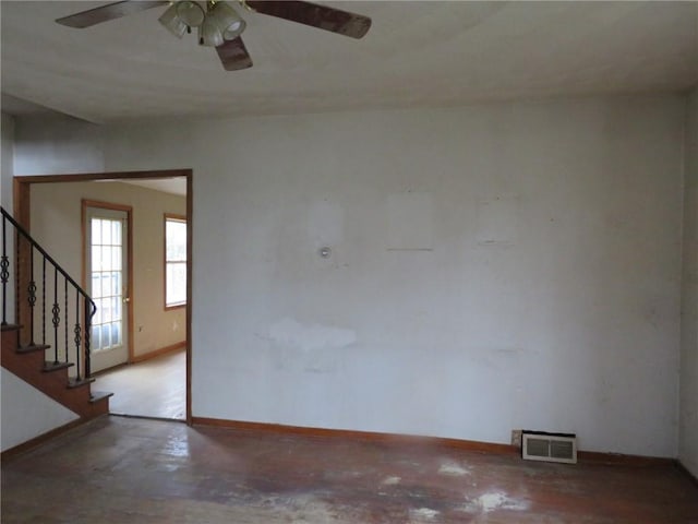 595 Amity Ridge Rd, Amwell, PA 15311 - unfurnished room with ceiling fan, stairs, and concrete flooring