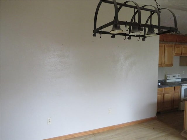595 Amity Ridge Rd, Amwell, PA 15311 - unfurnished dining area with light wood finished floors and baseboards