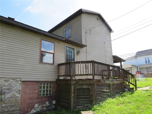595 Amity Ridge Rd, Amwell, PA 15311 - back of property featuring stairway, a deck, and a lawn