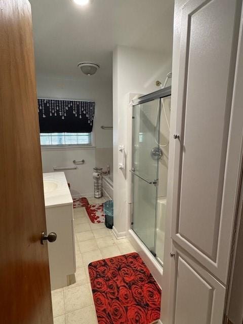 895 Donna Dr, Hermitage, PA 16148 - full bathroom with vanity, tile patterned flooring, and a shower stall