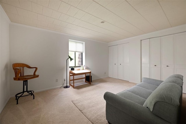 72 Linden Pl Unit 22, Sewickley, PA 15143 - living area with baseboards, light carpet, and crown molding