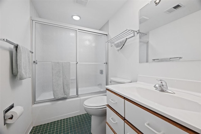72 Linden Pl Unit 22, Sewickley, PA 15143 - full bathroom with vanity, toilet, visible vents, and combined bath / shower with glass door