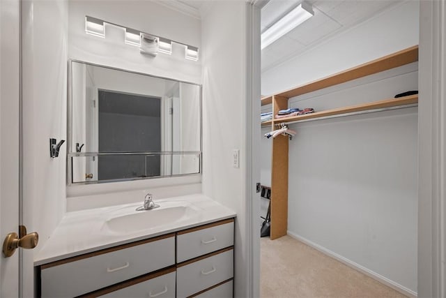 72 Linden Pl Unit 22, Sewickley, PA 15143 - bathroom featuring baseboards, vanity, and ornamental molding