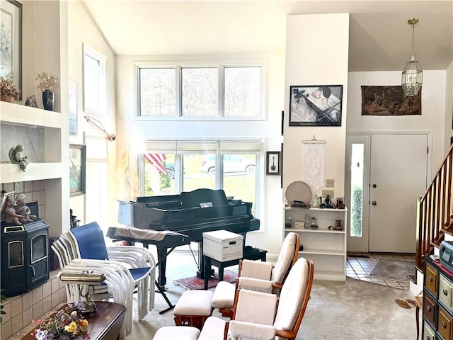 420 Edgewood Ave, White Twp Ind, PA 15701 - living area featuring carpet flooring, stairway, and high vaulted ceiling