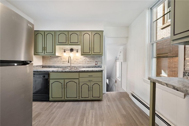 301 N Monroe St, City Of But Ne, PA 16001 - kitchen with a sink, freestanding refrigerator, green cabinetry, dishwasher, and light wood-style floors