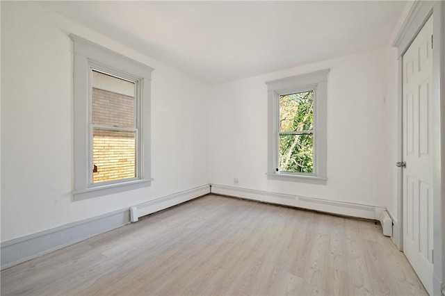301 N Monroe St, City Of But Ne, PA 16001 - unfurnished bedroom featuring baseboards and light wood-style flooring