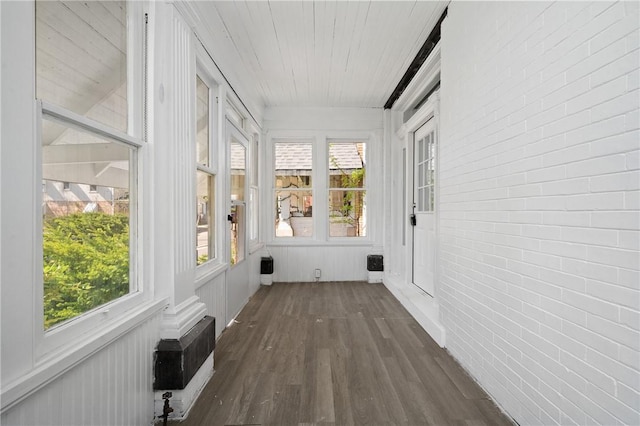 301 N Monroe St, City Of But Ne, PA 16001 - unfurnished sunroom with brick wall, wood ceiling, a healthy amount of sunlight, and wood finished floors