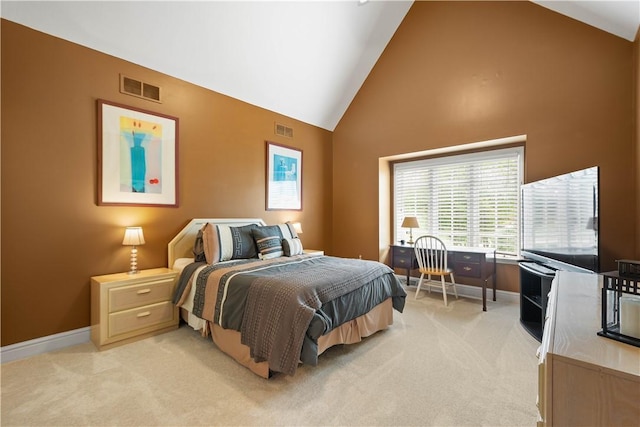 bedroom with light carpet, high vaulted ceiling, and visible vents