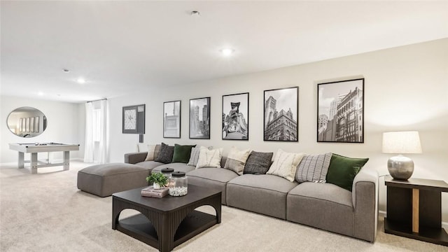 living area with baseboards, recessed lighting, and light colored carpet