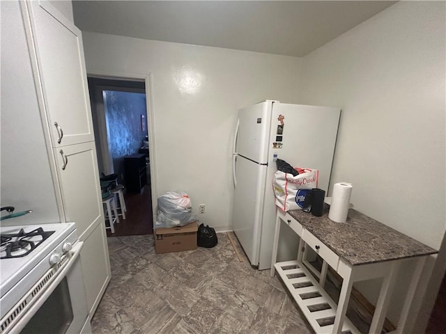 116 Ivy St, Wilkins Twp, PA 15145 - kitchen featuring white appliances, dark stone counters, and white cabinets