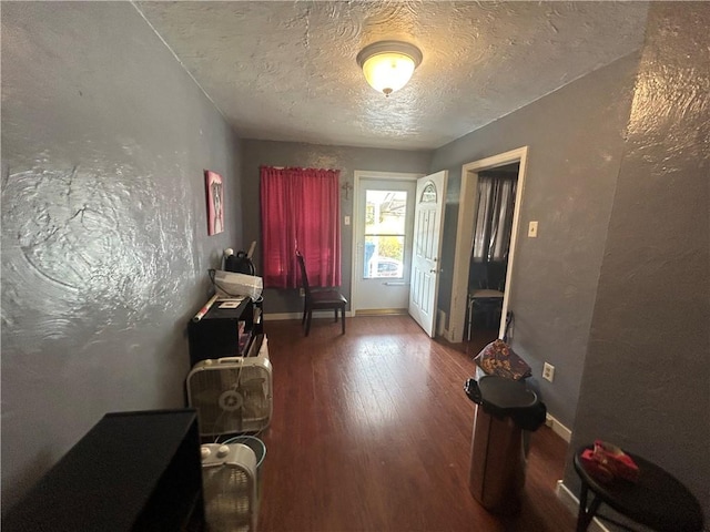 116 Ivy St, Wilkins Twp, PA 15145 - living area with a textured ceiling, wood finished floors, baseboards, and a textured wall