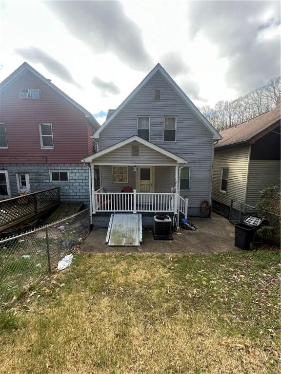 116 Ivy St, Wilkins Twp, PA 15145 - back of house with a yard, central AC, and a fenced backyard