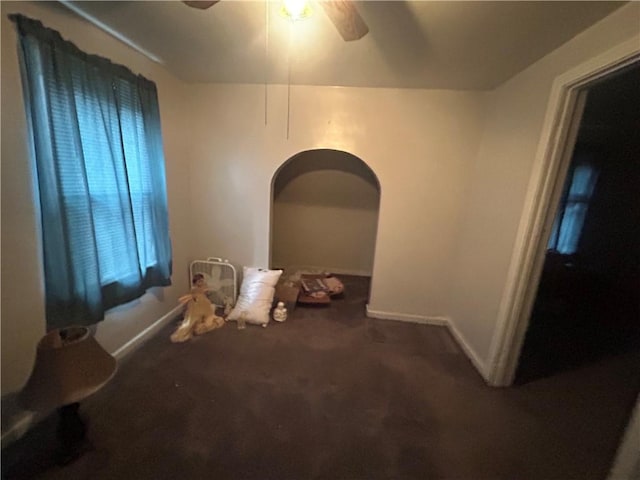 116 Ivy St, Wilkins Twp, PA 15145 - unfurnished bedroom with arched walkways, carpet flooring, a ceiling fan, and baseboards