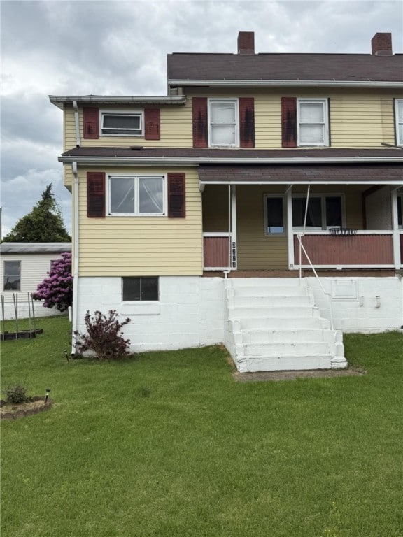 48 2nd St, Dunbar Twp, PA 15431 - rear view of house with a yard, stairway, and a porch