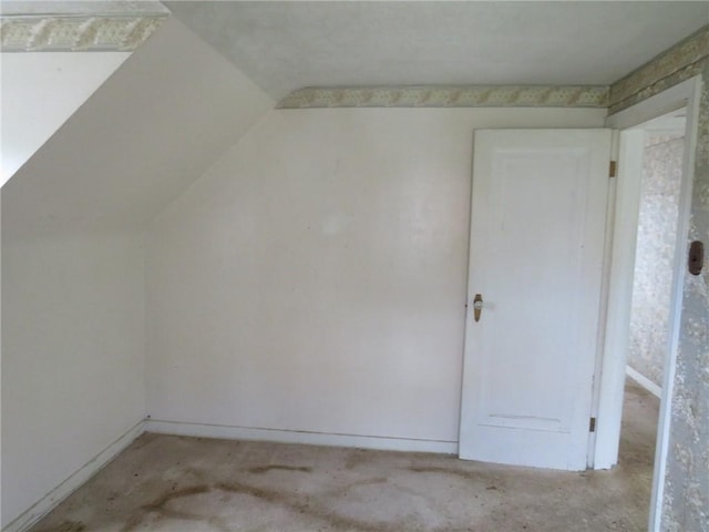 bonus room featuring lofted ceiling