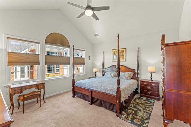 bedroom featuring a ceiling fan, visible vents, baseboards, light colored carpet, and vaulted ceiling