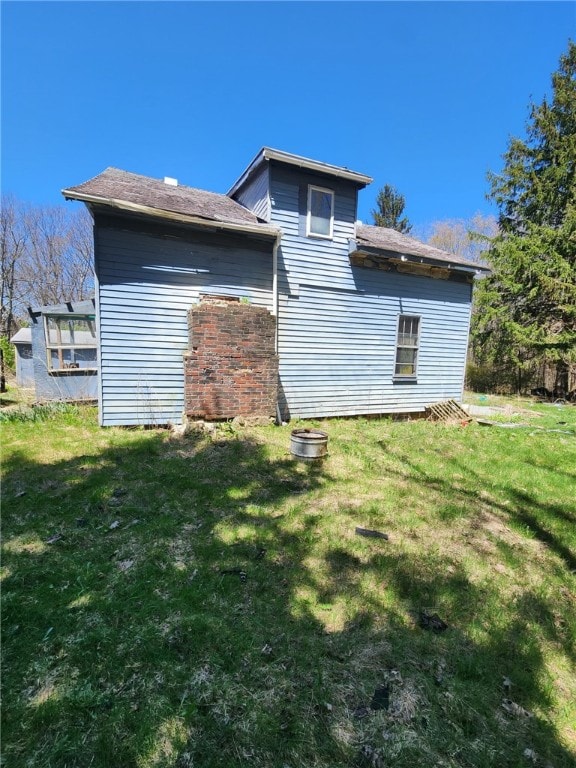 3324 Ridge Rd, Shade Twp, PA 15563 - back of house featuring a lawn