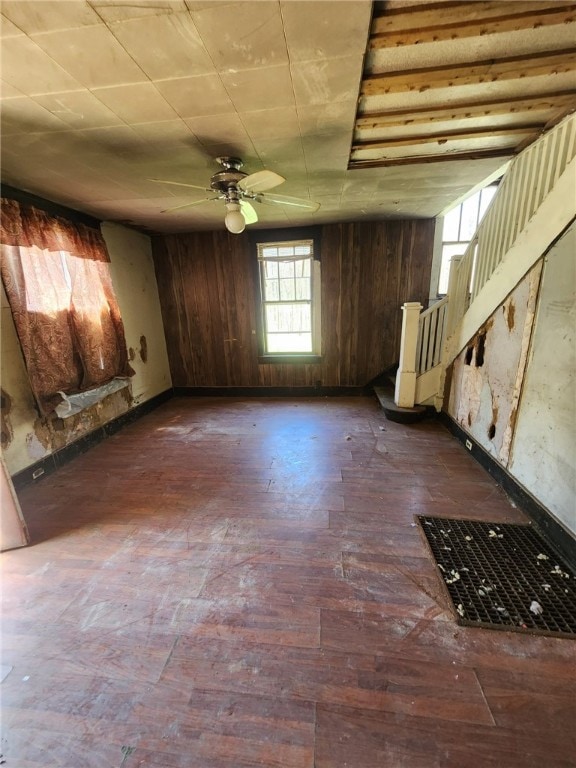 3324 Ridge Rd, Shade Twp, PA 15563 - unfurnished living room with a ceiling fan, wood-type flooring, and stairs