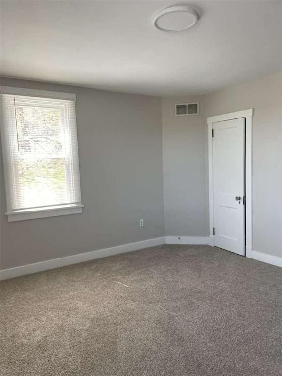 846 Neely Heights Ave, Coraopolis, PA 15108 - spare room featuring baseboards, carpet flooring, and visible vents