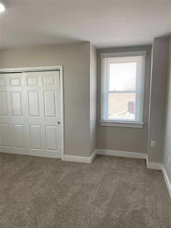 846 Neely Heights Ave, Coraopolis, PA 15108 - unfurnished bedroom featuring carpet, a closet, and baseboards