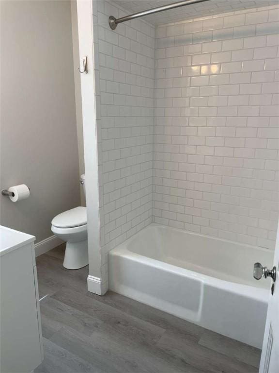 846 Neely Heights Ave, Coraopolis, PA 15108 - full bathroom featuring toilet, shower / washtub combination, wood finished floors, vanity, and baseboards