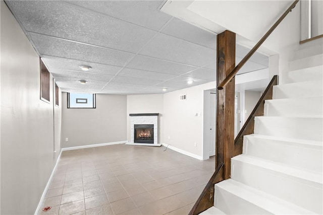 3606 Churchview Ave, Baldwin Boro, PA 15236 - interior space featuring a drop ceiling, a fireplace, visible vents, baseboards, and stairs
