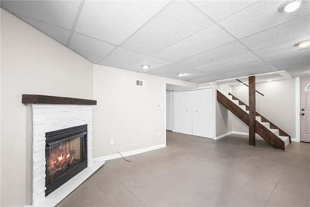 3606 Churchview Ave, Baldwin Boro, PA 15236 - unfurnished living room featuring baseboards, visible vents, stairs, a paneled ceiling, and a fireplace