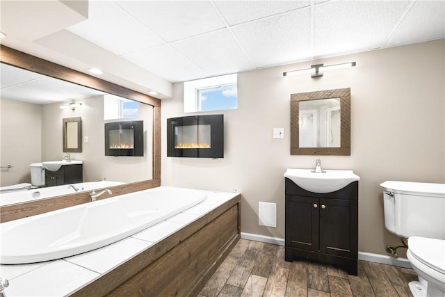 3606 Churchview Ave, Baldwin Boro, PA 15236 - bathroom with toilet, baseboards, a sink, and wood finished floors