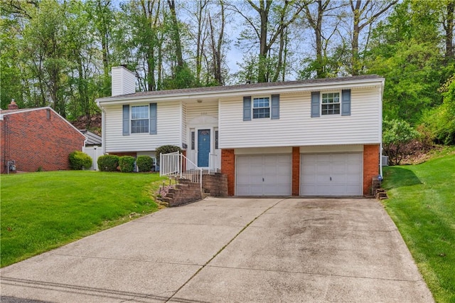 5993 Monongahela Ave, Bethel Park, PA 15102 - split foyer home with an attached garage, concrete driveway, brick siding, and a front yard