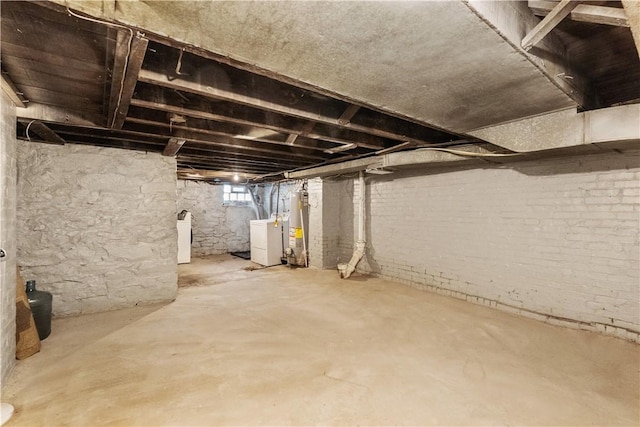 5126 Blair St, Hazelwood, PA 15207 - below grade area featuring washer / clothes dryer and water heater