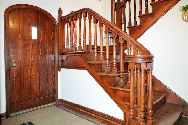 stairs featuring arched walkways