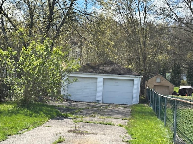 detached garage with fence