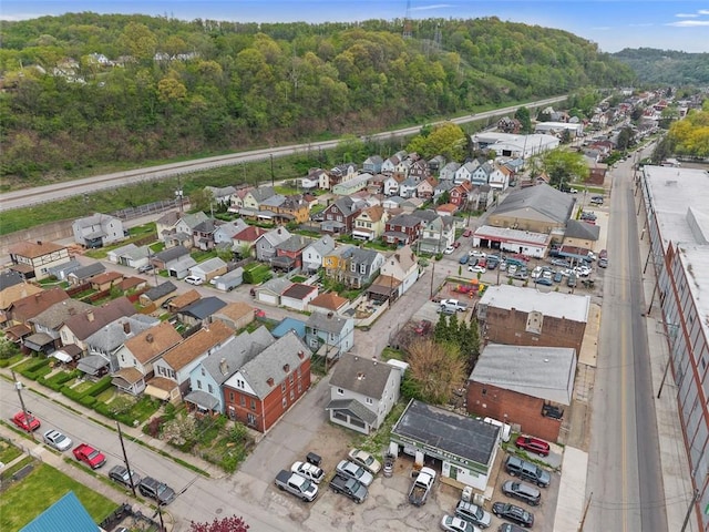 bird's eye view with a residential view and a view of trees