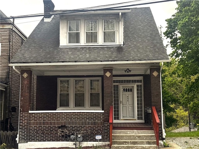 636 Lincoln Ave, East Liberty, PA 15206 - cape cod home with a porch and brick siding