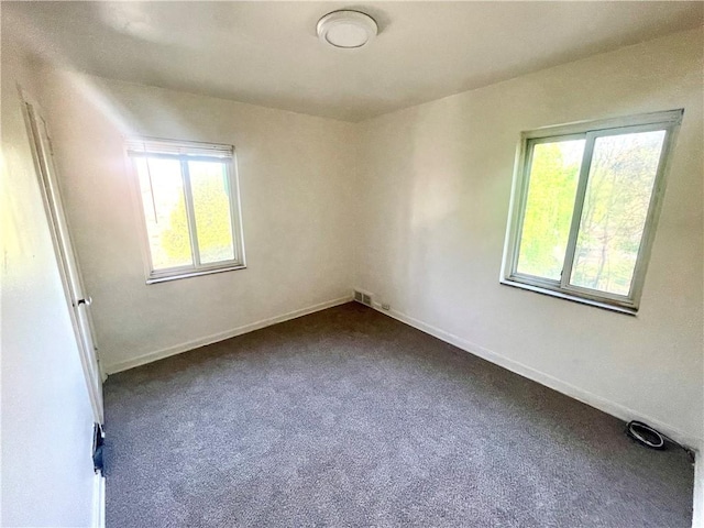5850 Heberton Dr, Penn Hills, PA 15147 - unfurnished room with dark carpet and baseboards