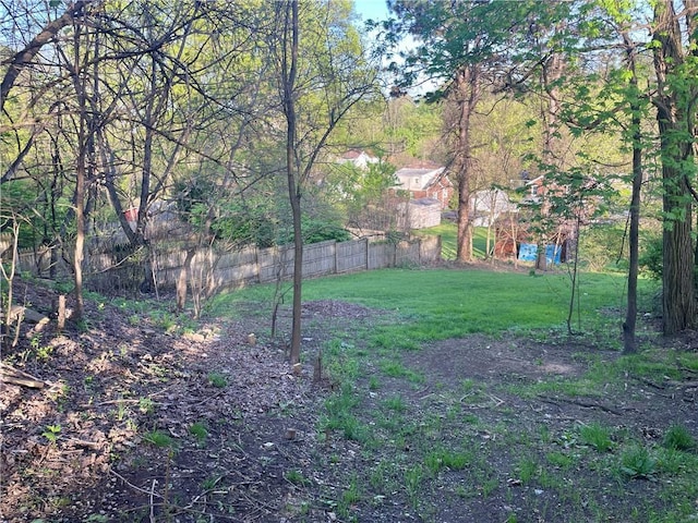 view of yard with fence