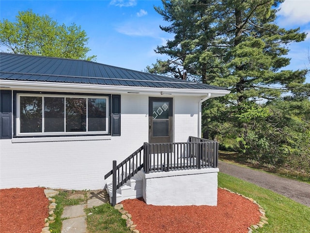 54 Devils Den Rd, Hanover Twp Wsh, PA 15021 - view of front facade with brick siding and metal roof