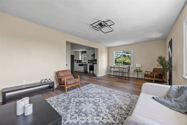 54 Devils Den Rd, Hanover Twp Wsh, PA 15021 - living room with baseboards and dark wood-type flooring