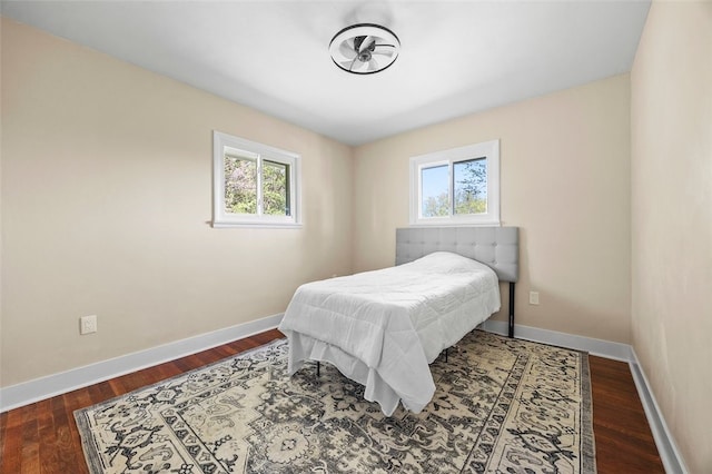 54 Devils Den Rd, Hanover Twp Wsh, PA 15021 - bedroom featuring multiple windows, dark wood-style flooring, and baseboards