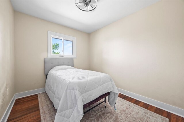 54 Devils Den Rd, Hanover Twp Wsh, PA 15021 - bedroom with baseboards and wood finished floors