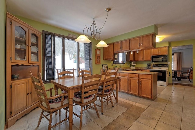 dining space with light tile patterned floors