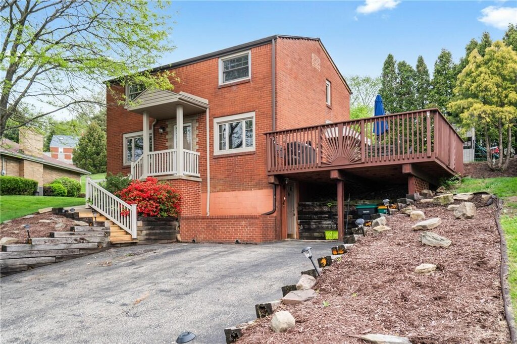 737 Parkview Blvd, Ohara, PA 15215 - exterior space featuring a wooden deck and brick siding