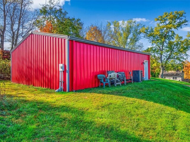 281 Bear Creek Rd, Buffalo Twp But, PA 16055 - view of pole building with a yard and central AC unit
