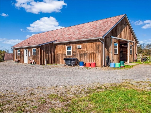 exterior space with an outbuilding